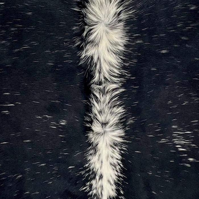 Closeup of this Speckled Brazilian Cowhide, showing black with white speckles, and white down the spine (BRSP3540)