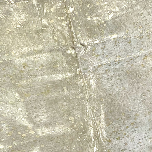 Closeup of this White, Brazilian Cowhide, showing a gold, metallic acid wash (BRAW442)