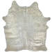 Large White Brazilian Cowhide w/ Gold Acid Wash:  white cowhide that has been treated with a gold, metallic acid wash - 7'7" x 6'3" (BRAW444)