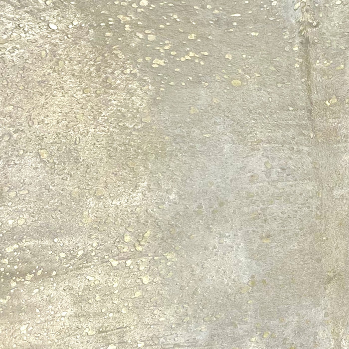 Closeup of this Large, White, Brazilian Cow hide, showing a gold, metallic acid wash (BRAW444)