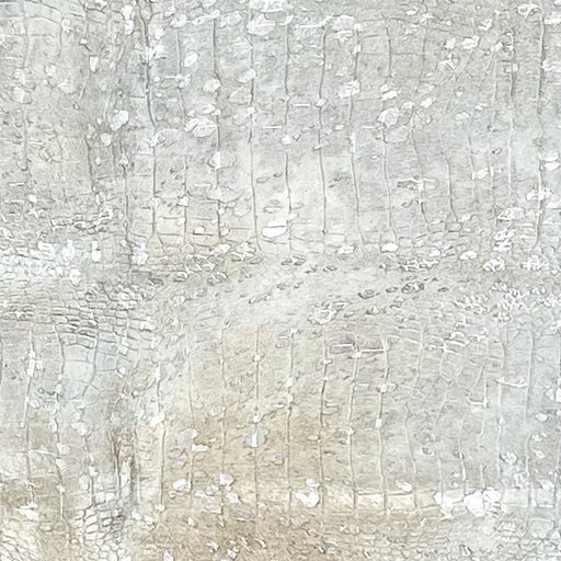 Closeup of this XL Off-White Brazilian Cowhide, with  light brown down the middle of the back and butt, showing an embossed Croc Print and Silver Metallic Acid Wash  (BRAW460)