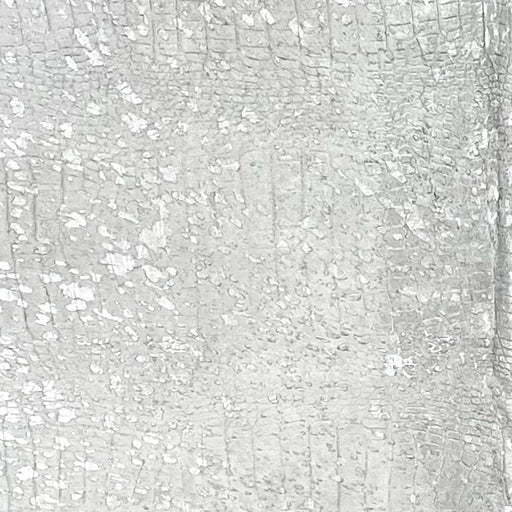 Closeup of this XL Off-White Brazilian Cowhide, showing an  embossed Croc Print and Silver Metallic Acid Wash (BRAW462)