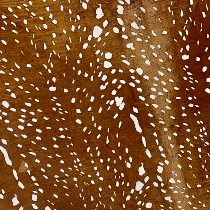 Closeup of this Brazilian Cowhide, showing a brown and white, Axis Deer Print  - 6'11" x 5'9" (BRAXISP029)