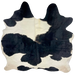 Black and White Brazilian Cowhide:  white with large, black spots that have hints of blackish brown - 6'7" x 6'2" (BRBKW259)