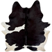 XXL Black and White Brazilian Cowhide: black with white spots, and off-white on the belly and hind shanks - 8'7" x 6'9"  (BRBKW292)