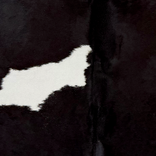 Closeup of this XXL Brazilian Cowhide, showing black and a white spot (BRBKW292)
