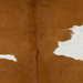 Closeup of this Brazilian Cowhide, showing brown with white spots that have brown speckles (BRBNW398)