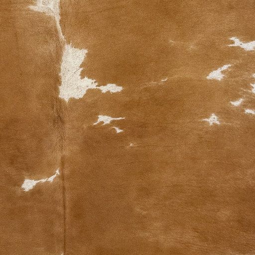 Closeup of this Brazilian Cowhide, showing brown and white spots that have brown speckles (BRBNW403)