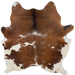 Brown and White Brazilian Cowhide:  brown with white speckles and spots, black down the middle of the shoulder, and off-white on the belly and hind shanks  - 6'7" x 5'9"  (BRBNW418)