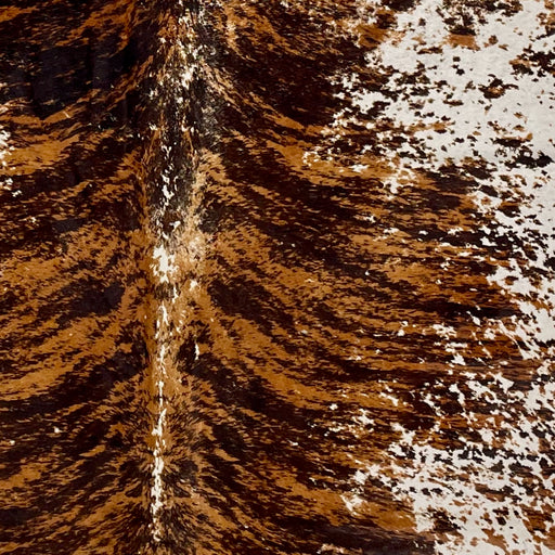 Closeup of this XL, White, Brazilian Cowhide, showing a Brown and Black, Brindle Print, and some printed brown and black spots (BRBR-P001)
