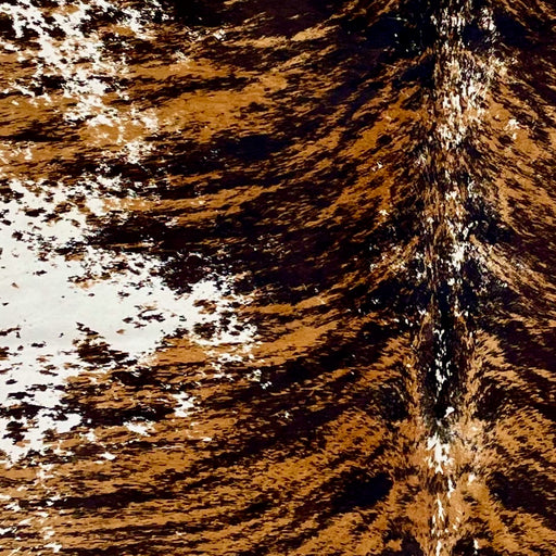 Closeup of this XL ,White, Brazilian Cowhide, showing a Brown and Black, Brindle Print, and some brown and black, printed spots (BRBR-P002)
