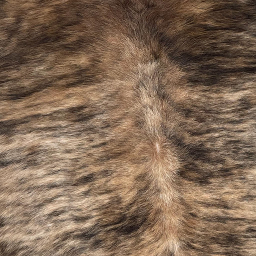 Closeup of this Brazilian Brindle Cowhide, showing off-white and brown, with black, brindle markings (BRBR1125)