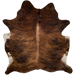 Brown and Black Brazilian Brindle Cowhide:  long hair that is brown, with black, brindle markings, off-white down part of the spine, and a splash of off-white on the belly - 6'11" x 5'10" (BRBR1133)