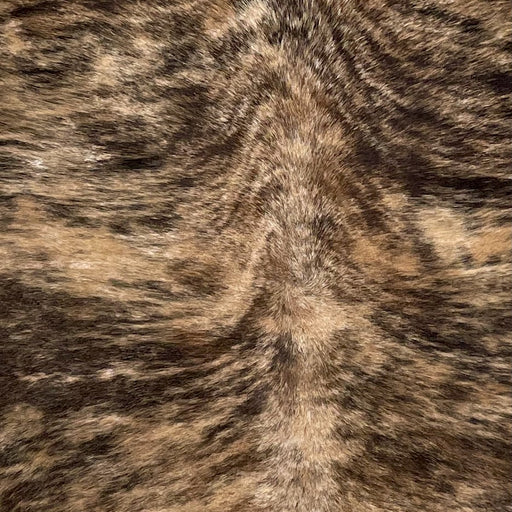 Closeup of this Large, Brazilian, Brindle Cowhide, showing brown and tan, with black, brindle markings and black spots (BRBR1168)