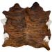 Reddish Brown and Black Brazilian Brindle Cowhide: reddish brown, with black, brindle markings, and it has a couple white spots on the belly - 6'6" x 6'4" (BRBR1266)