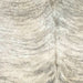 Closeup of this Brazilian Light Brindle Cowhide, showing light beige with gray, brindle markings (BRBR1281)