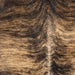 Closeup of this Large Brazilian Brindle Cowhide, showing tan and brown with black and brown, brindle markings (BRBR1484)