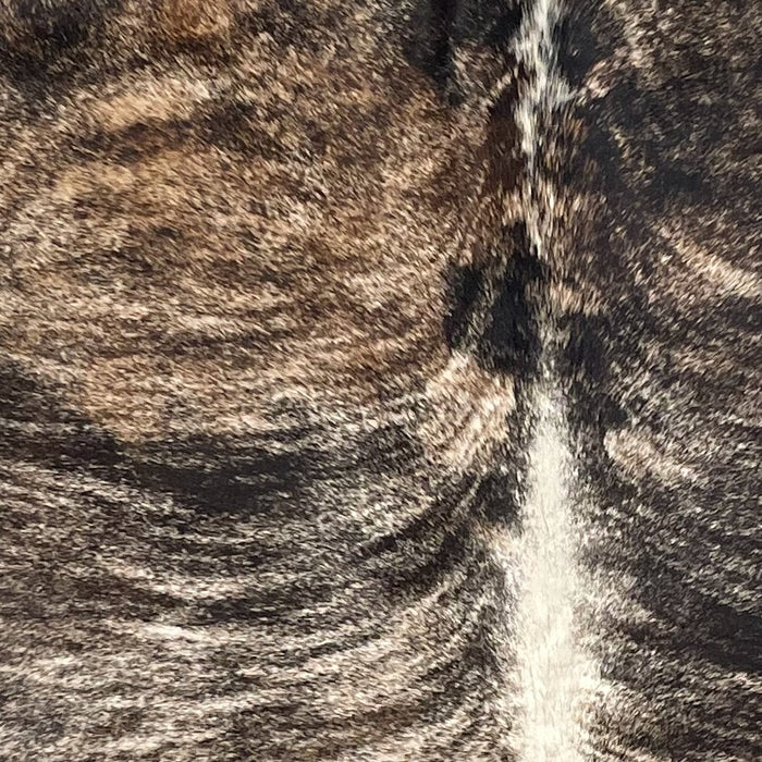 Closeup of this Brazilian Brindle Cowhide:, showing off-white and brown, with black, brindle markings  (BRBR1492)