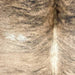 Closeup of this Brazilian Brindle Cowhide, showing tan and brown with black, brindle markings  (BRBR1510)