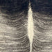 Closeup of this XL Brazilian Brindle Cowhide, showing black with ivory, brindle markings and ivory down the spine (BRBR1515)