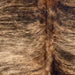 Closeup of this XL Brown and Black Brazilian Brindle Cowhide, showing light brown and darker brown with black and brown, brindle markings (BRBR1519)