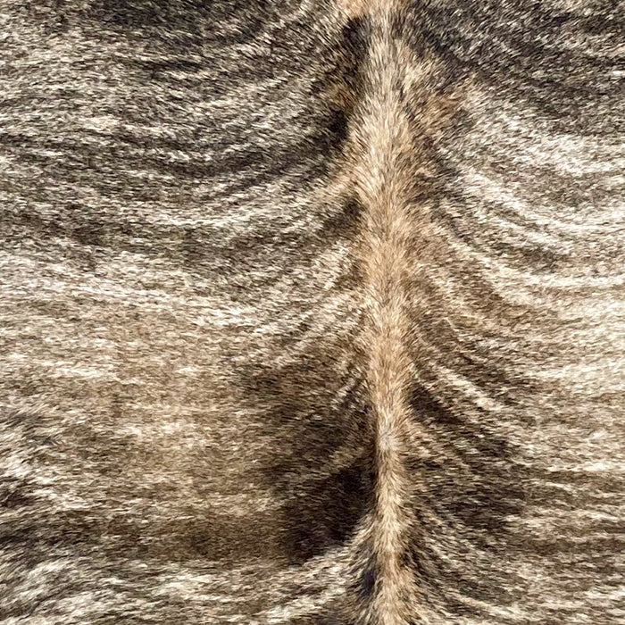 Closeup of this Large Brazilian Brindle Cowhide, showing ivory with brown and black, brindle markings (BRBR1520)