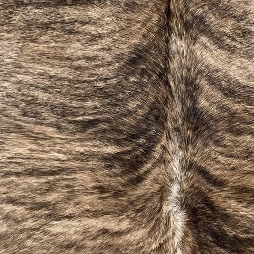 closeup of this Brazilian Brindle Cowhide, showing tan and brown with black, brindle markings (BRBR1525)