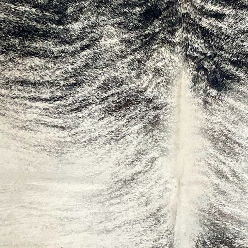 Closeup of this Brazilian Brindle Cowhide, showing ivory with black, brindle markings  (BRBR1555)