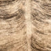 Closeup of this Brazilian Brindle Cowhide, showing light tan and brown with black and brown, brindle markings (BRBR1572)