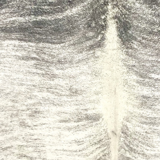 Closeup of this Brindle Cowhide, showing ivory with dark and light gray, brindle markings (BRBR1583)