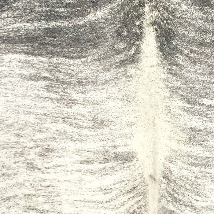 Closeup of this Brindle Cowhide, showing ivory with dark and light gray, brindle markings (BRBR1583)
