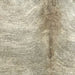 Closeup of this Brazilian Brindle Cowhide, showing off-white and light beige with gray, brindle markings (BRBR1586)