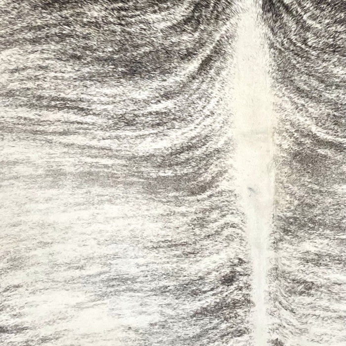 Closeup of this Large Brazilian Brindle Cowhide, showing  ivory with black and gray, brindle markings (BRBR1587)