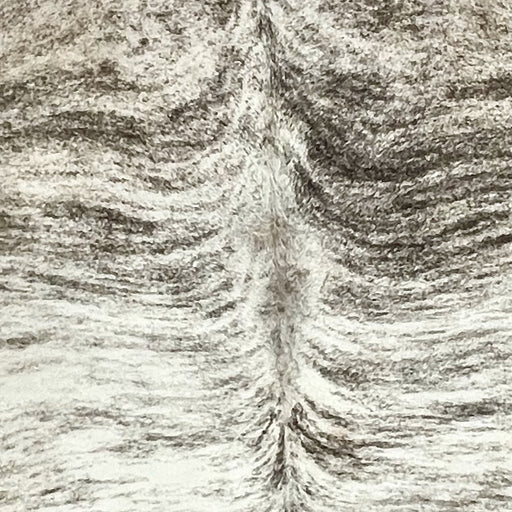 Closeup of this extra-large Brazilian Brindle Cowhide, showing white with black, brindle markings (BRBR1593)