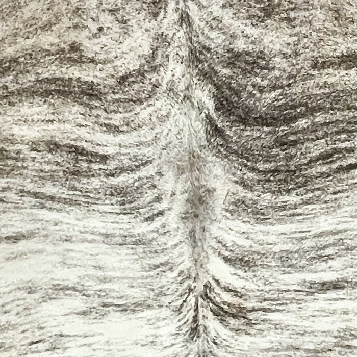 Closeup of this extra-large Brazilian Brindle Cowhide, showing white with black, brindle markings (BRBR1593)