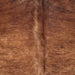 Closeup of this Large Brazilian Brindle Cowhide, showing reddish brown with black, brindle markings, and fine, white speckles down the spine (BRBR1632)