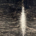 Closeup of this Brazilian Brindle Cowhide, showing black with light brown, brindle markings, and white down part of the spine (BRBR1636)