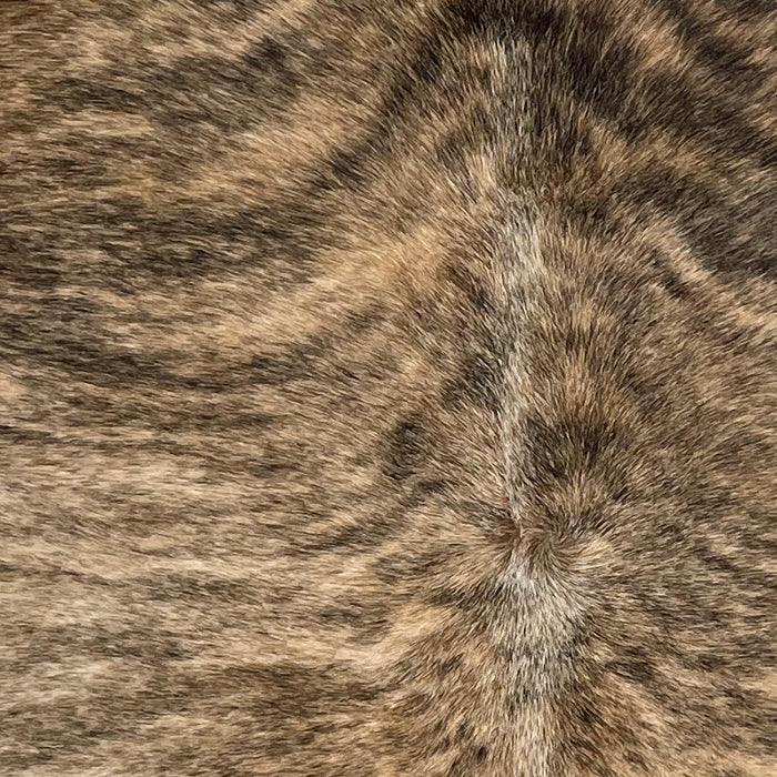 Closeup of this Large Brazilian Brindle Cowhide, showing light tan and brown, with black, brindle markings (BRB1658)
