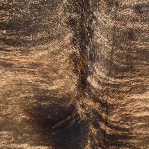 Closeup of t his Large Brazilian Brindle Cowhide, showing light brown with dark brown, brindle markings (BRBR1660)