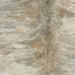 Closeup of this Large Brazilian Brindle Cowhide, showing ivory and light brown with gray, brindle markings (BRBR1702