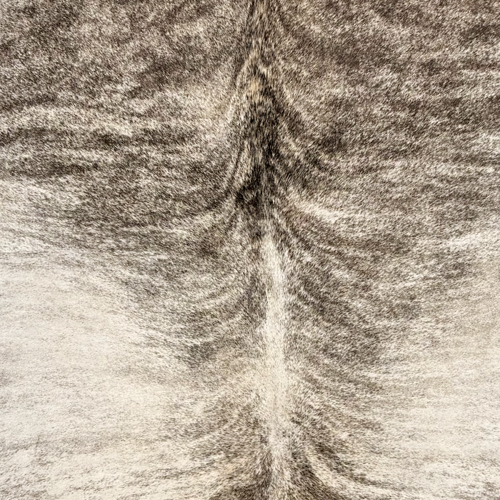 Closeup of this Brazilian Brindle Cowhide, showing ivory with black, brindle markings  (BRBR1768)