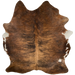 Two Tone Brown and Black Brazilian Brindle Cowhide:  reddish brown and golden brown with black, brindle markings, and white on part of the belly - 7'3" x 5'9" (BRBR972)