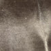Closeup of this Large, Gray and Dark Taupe, Brazilian Cowhide, showing gray with dark taupe on the shoulder (BRGR199)