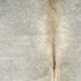 Closeup of this Brazilian Cowhide, showing gray with light beige, longer hair, down the spine  (BRGR263)