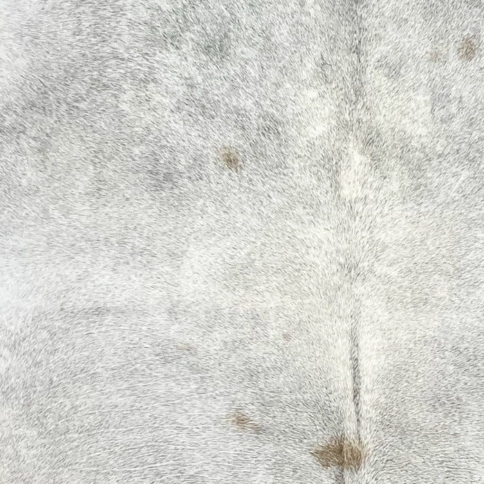 Closeup of this Large Brazilian Cowhide, showing light with a few small, brown spots (BRGR272)