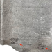 closeup of this Large Gray Brazilian Cowhide, showing two brand marks on the right side of the butt (BRGR287)