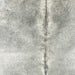 closeup of this XL Brazilian Cowhide, showing light gray with darker gray down part of the spine (BRGR288)