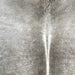 closeup of this Brazilian Cowhide, showing a mix of light gray and medium gray, and white down the spine (BRGR292)