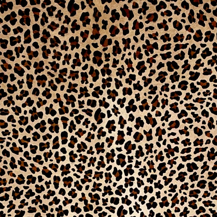Closeup of this Light Brown, Brazilian Cowhide, showing a stenciled, brown and black, Leopard Print (BRLP087)