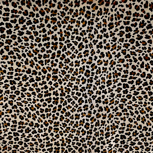 Closeup of this Light Beige, Brazilian Cowhide, showing a brown and black, leopard print (BRLP118)